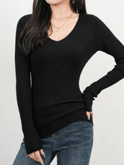 Black ribbed V-neck fitted knit sweater with long sleeves.