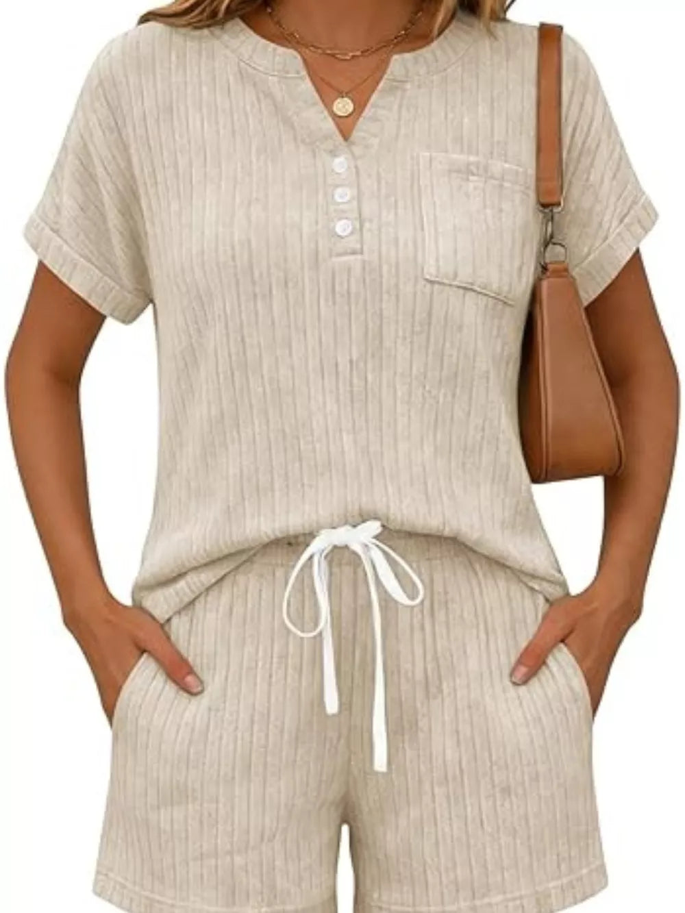Apricot ribbed knit loungewear set with henley top and drawstring shorts.