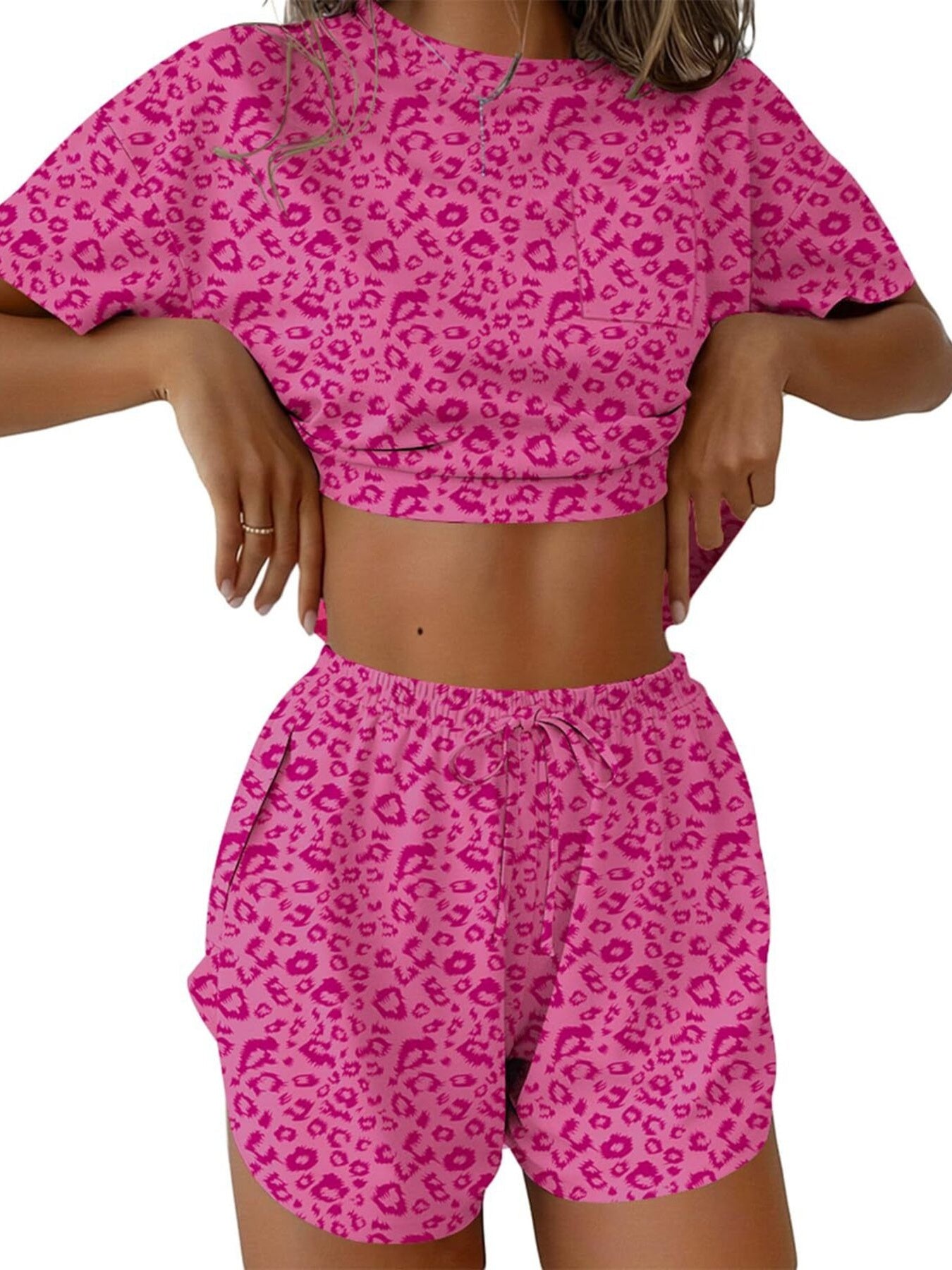 Pink leopard print pajama set with drawstring shorts and cropped t-shirt