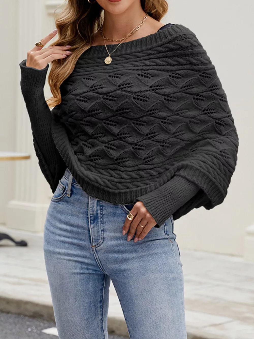 Cable Knit Batwing Sleeve Sweater in Black, side view