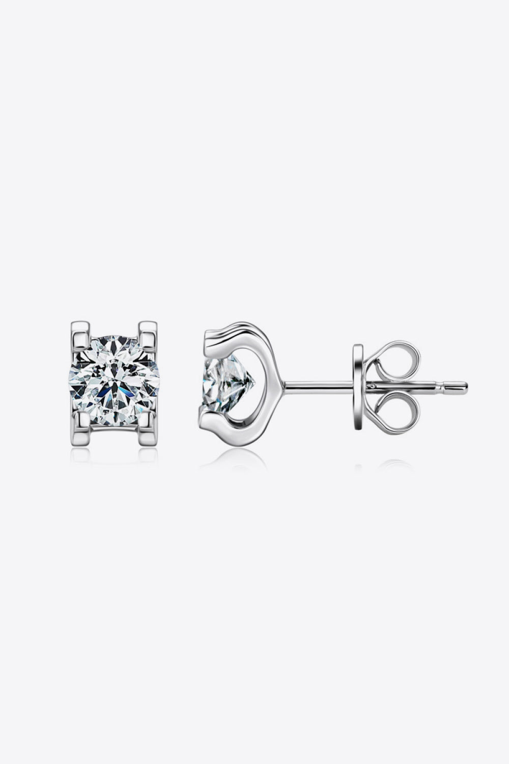 Silver moissanite solitaire stud earrings with classic prong setting.