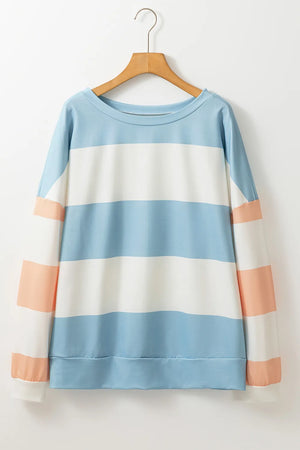 Striped sweatshirt with block sleeves in light blue, white, and blush pink.