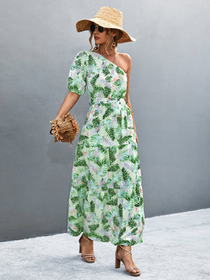 Light green tropical print one-shoulder maxi dress with balloon sleeves and tiered skirt.