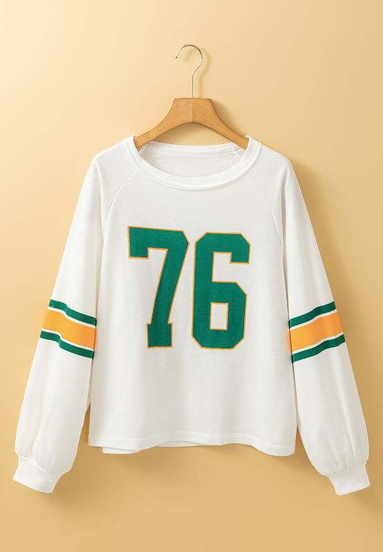 White raglan sleeve sweatshirt with green and orange striped sleeves and a large green '76' graphic.