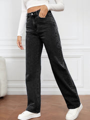 Black wide-leg denim jeans with a sculpted high rise, shown on a model.