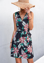 Black floral mini dress with zip front, tie waist, and V-neck
