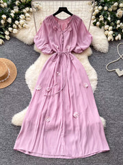 Purple puff sleeve maxi dress with floral appliques and tie waist