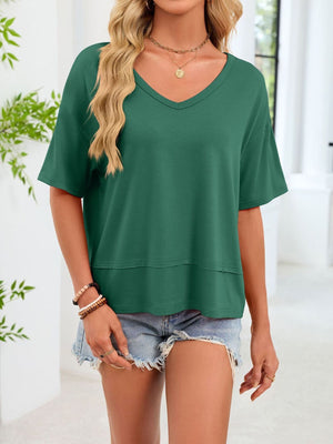 Relaxed fit dark green v-neck t-shirt with short sleeves and a layered hem detail.