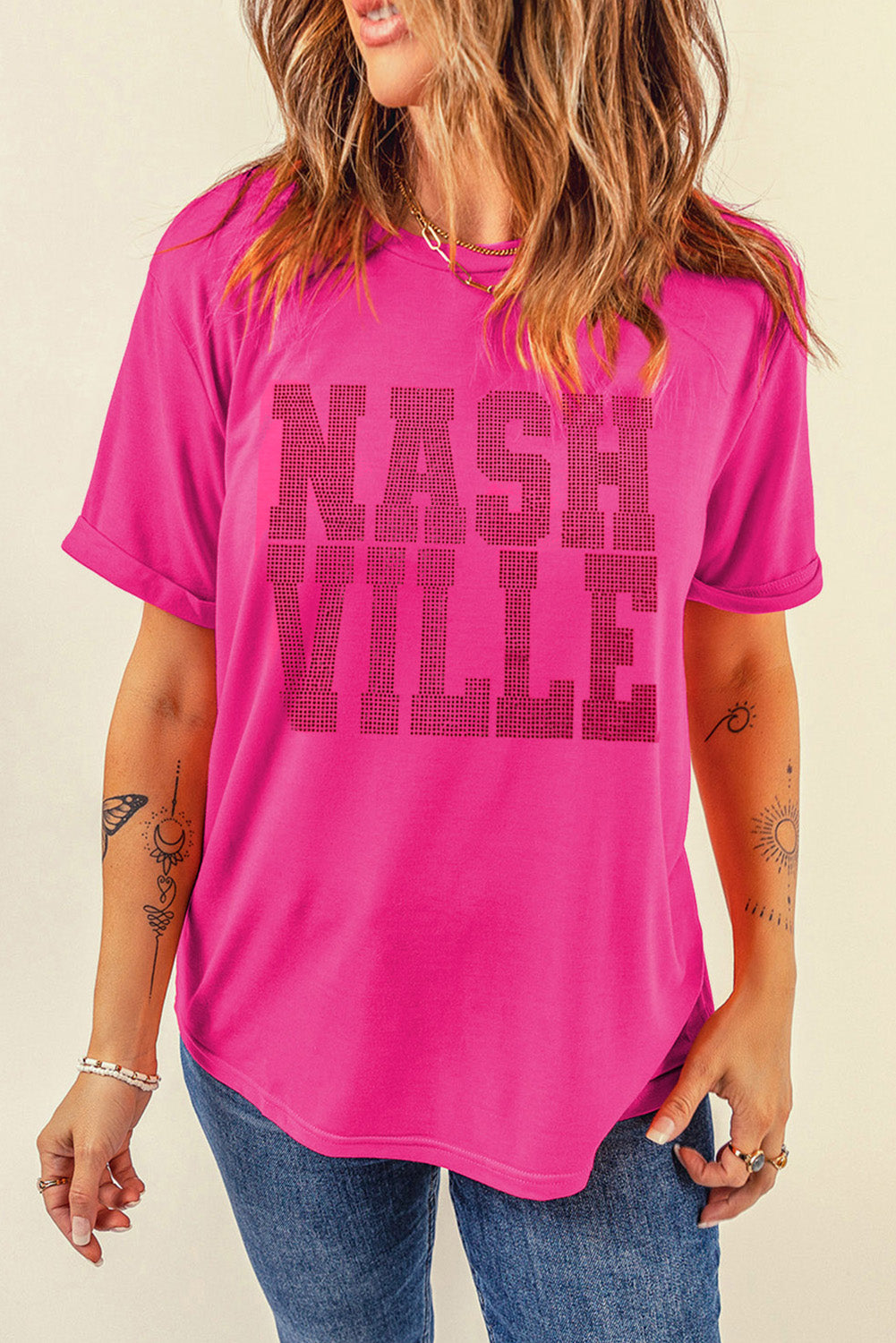 Hot pink Nashville graphic tee with rolled sleeves and a relaxed fit.