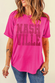 Hot pink Nashville graphic tee with rolled sleeves and a relaxed fit.