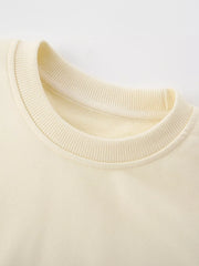 Cream crew-neck sweatshirt for kids with ribbed collar detail