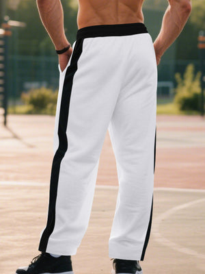 Men's white sweatpants with black side stripes and drawstring waist.