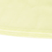 Light yellow airy cami and maxi skirt set fabric detail with subtle texture and double stitching.