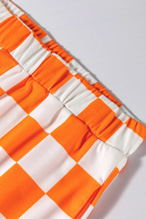 Tangerine and white checkered outfit set with elastic waistband detail.