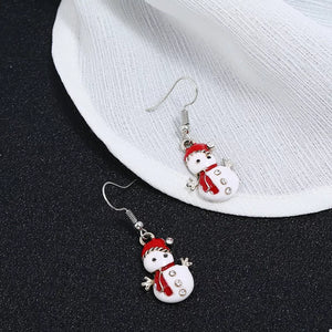 Festive snowman drop earrings with red scarf and hat, adorned with rhinestones.