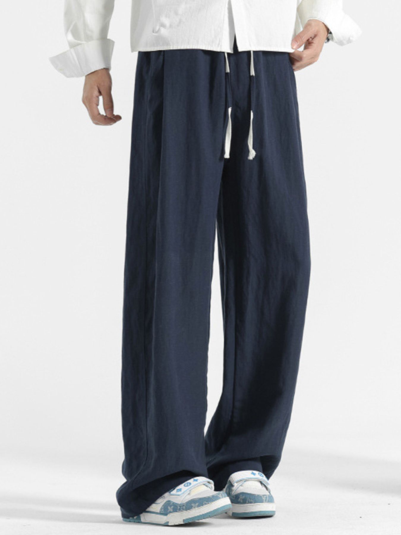 Men's navy blue relaxed fit sweatpants with drawstring waist