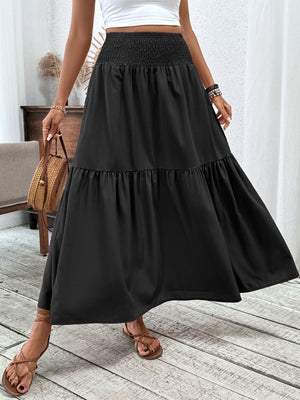 Black ruffled smocked waist maxi skirt with tiered hem