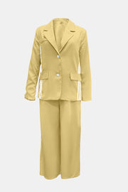 Pastel yellow pant suit with white track stripes on blazer and pants.