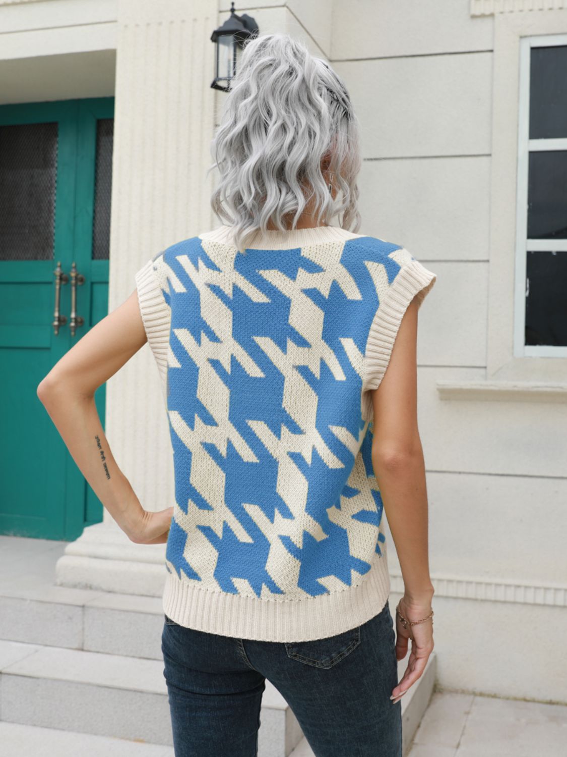 Houndstooth knit v-neck pullover vest in Azure and cream acrylic.