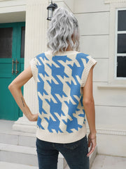 Houndstooth knit v-neck pullover vest in Azure and cream acrylic.