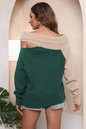 Asymmetric shoulder block sweater in dark green and beige acrylic with off-the-shoulder neckline.