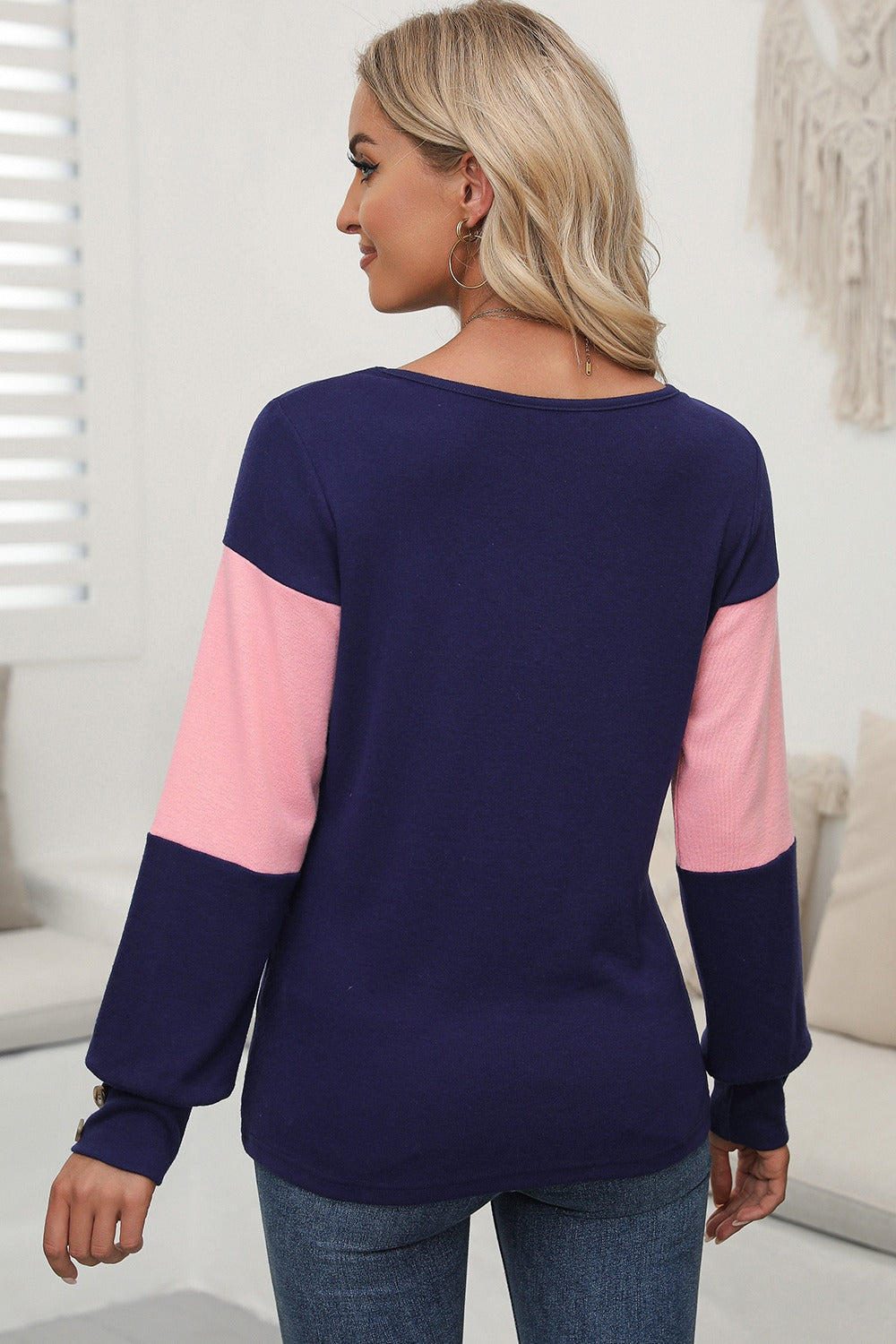 Navy and blush pink contrast panel sweater with button cuff detail