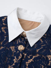 Navy lace midi dress with white collar and gold button details.