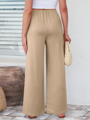 Pleated palazzo trousers in taupe with pockets and a wide leg