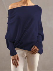 Dark Blue off-shoulder drape knit sweater with textured cuffs and batwing sleeves.