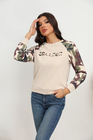 Cream sweatshirt with camouflage raglan sleeves and "COLLEGE" graphic.