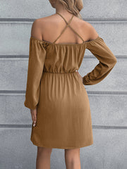 Khaki cross-strap off-shoulder mini dress with elastic waist and long sleeves.
