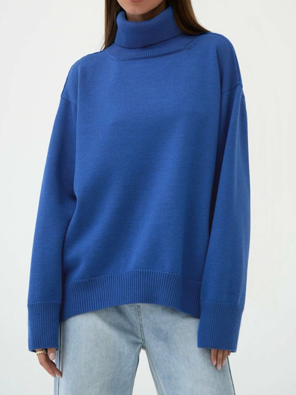 Relaxed roll-neck sweater in Royal Blue, boxy knit with ribbed cuffs and hem.