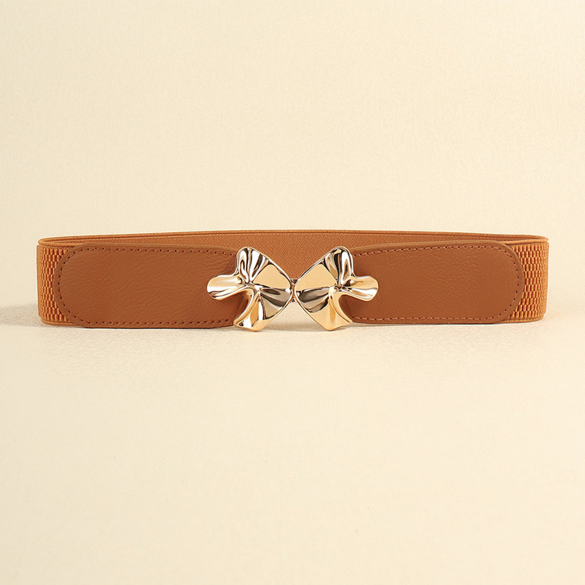 Caramel elasticated waist belt with gold bow clasp detail