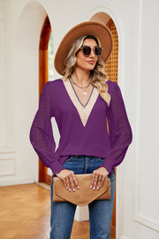 Purple knit v-neck blouse with lace sleeves and textured trim