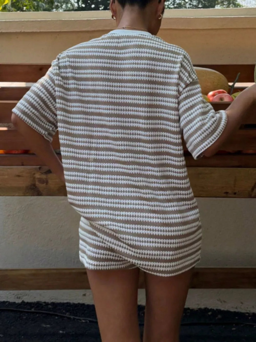 Striped relaxed fit two-piece set in khaki stripes with short sleeves and shorts.