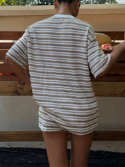 Striped relaxed fit two-piece set in khaki stripes with short sleeves and shorts.