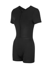 Black short-sleeve romper with front zipper and cutout back detail.