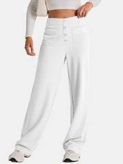 White button-front palazzo trousers with four decorative flap pockets and a high waist.