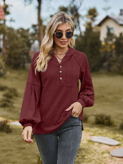 Textured knit henley in wine with balloon sleeves and button detail