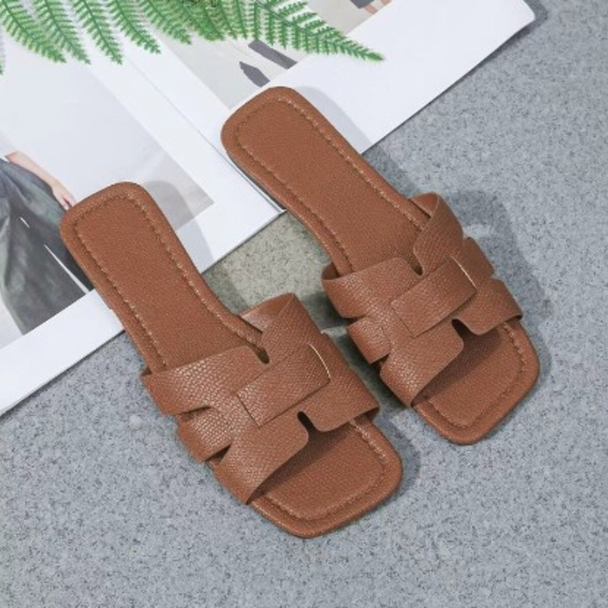 Brown woven strap flat sandals with chic design
