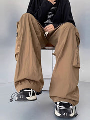 Men's camel cargo sweatpants with drawstring and zip pockets, relaxed fit.