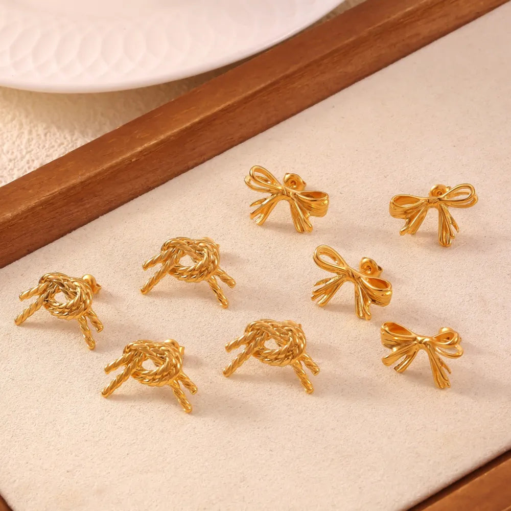 Golden bow stud earrings, Style A and Style B, with knot and ribbon designs.
