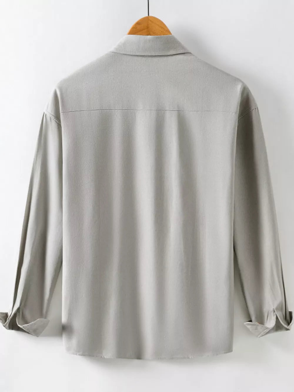 Light gray cotton long sleeve button-up shirt with a classic collar and a back yoke detail.