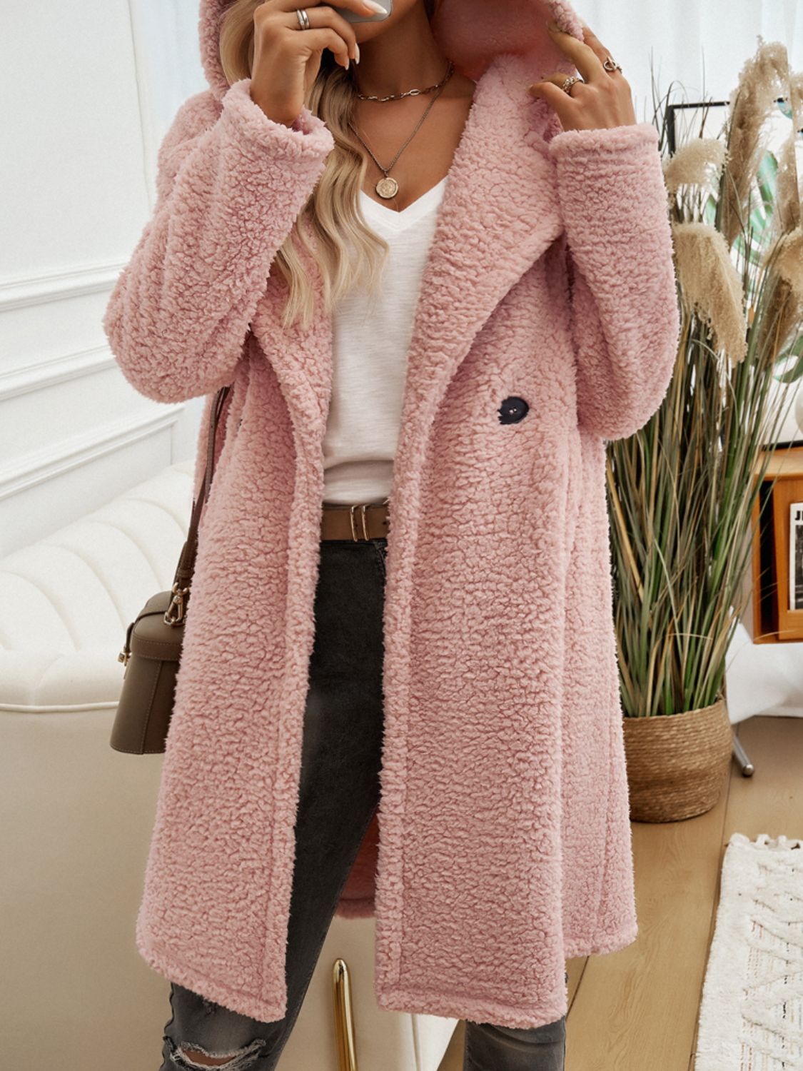 Dusty Pink teddy hooded cocoon coat with a single button closure and textured fleece fabric.