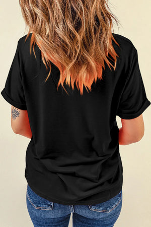 Black graphic t-shirt with rolled sleeves and a relaxed fit.