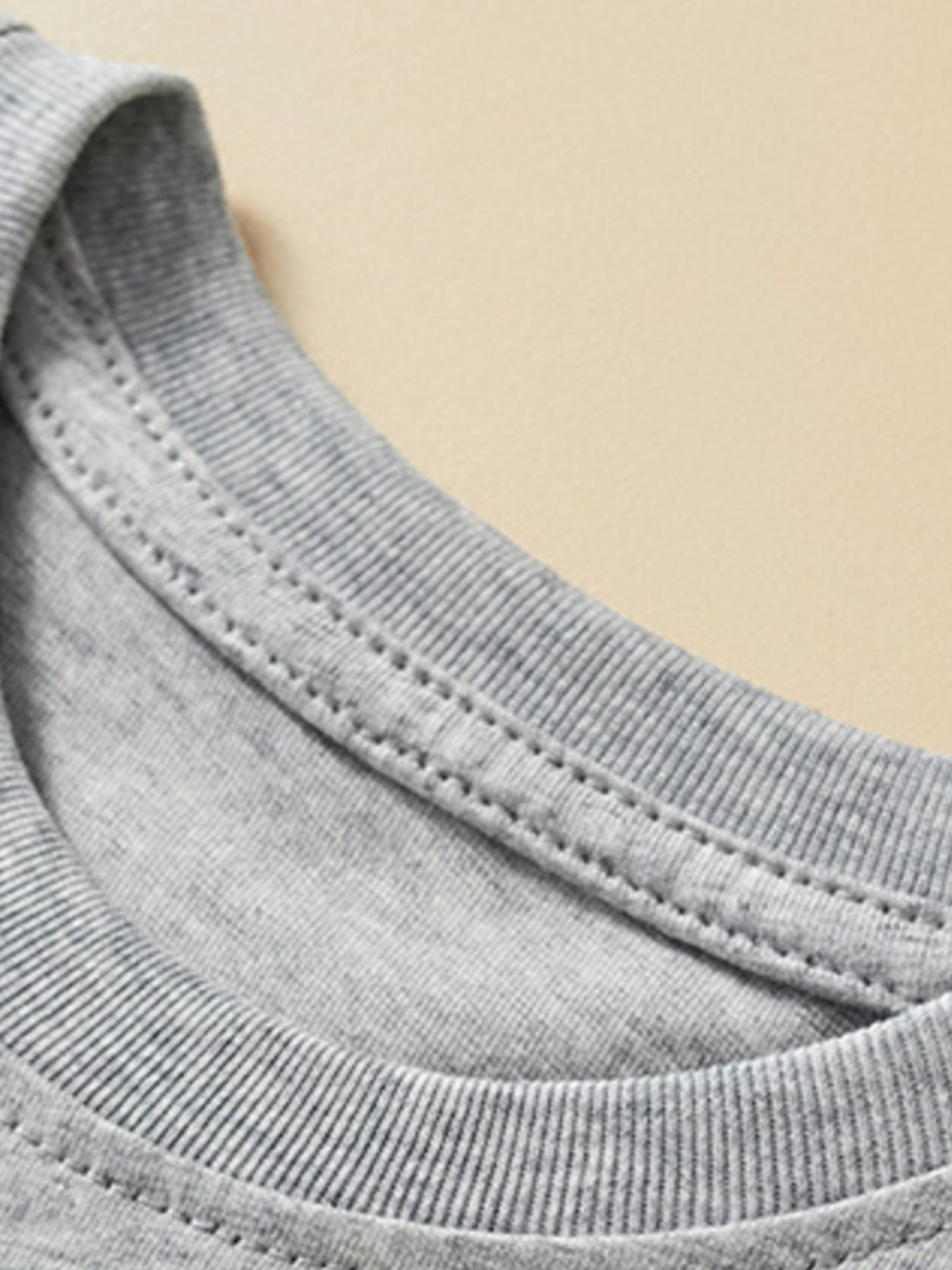 Toddler grey cotton tee neckline detail with double stitching