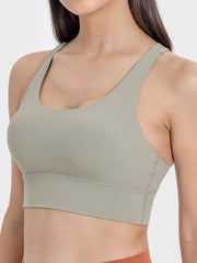 Sage green sports bra with scoop neck and wide band