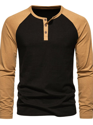 Men's long sleeve black henley t-shirt with tan raglan sleeves and button placket.