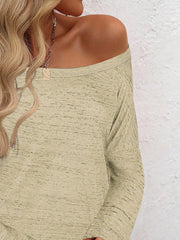 Off-the-shoulder heathered knit top in tan with long sleeves.