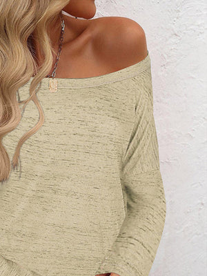 Off-the-shoulder heathered knit top in tan with long sleeves.
